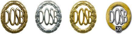 Verschiedene Medaillen des Deutschen Olympischen Sportbundes (DOSB) in Gold, Silber, Bronze und zum 20-jährigen Jubiläum.